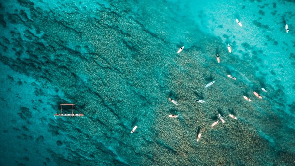 Glass-bottom boat rides over coral reefs in Andaman
